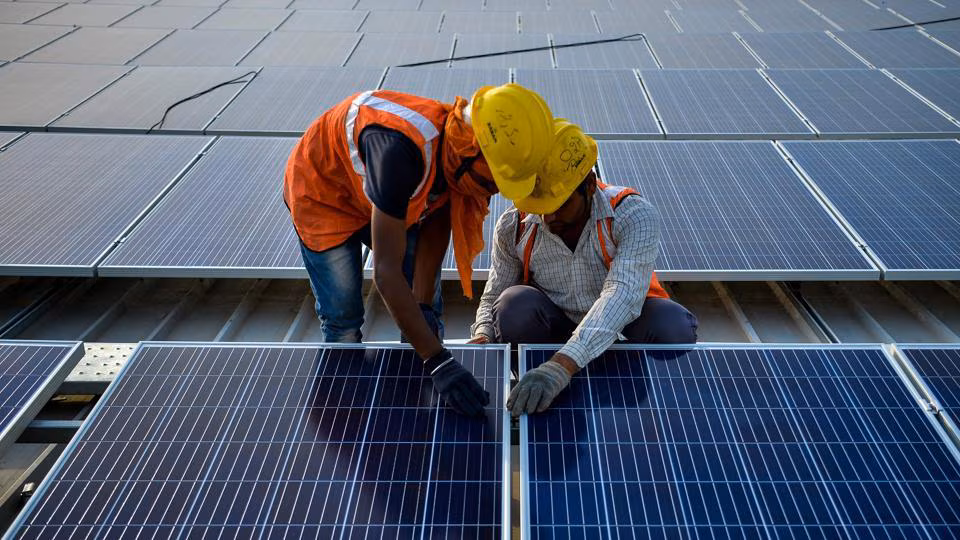 Prime Solar team discussing renewable energy